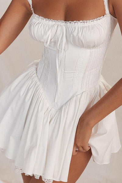 VESTIDO MINI ABULLONADO CON CORSÉ DE ENCAJE INÉS