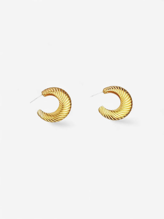 TWISTED BOLD | AROS ESCULPURALES CON MOVIMIENTO ELEGANTE