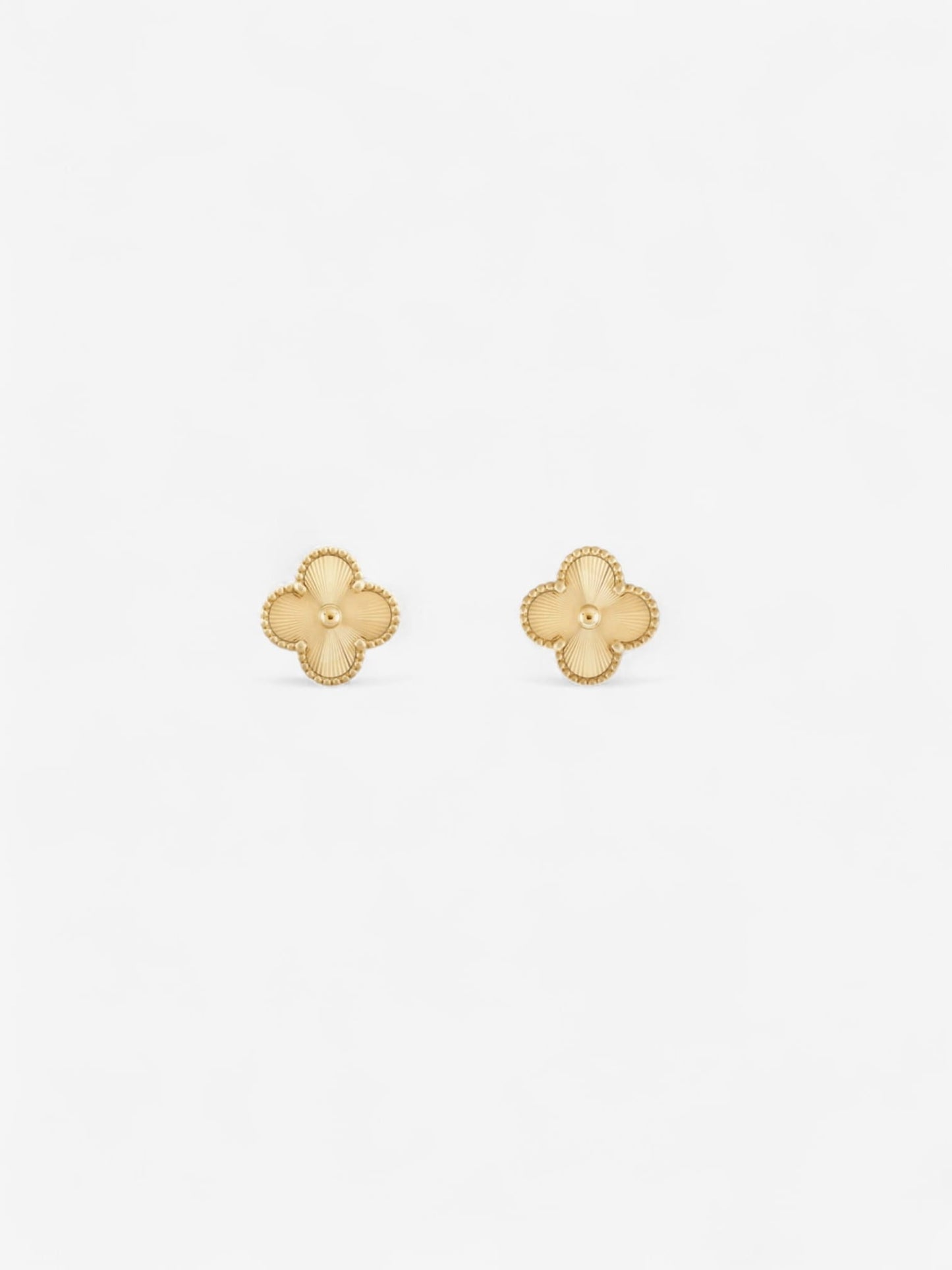 FLORA STUDS | PENDIENTES FLORALES CON BRILLO SUTIL