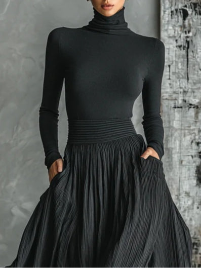 CONJUNTO NEGRO ELENA™ | CUELLO ALTO AJUSTADO Y FALDA PLISADA ELEGANTE