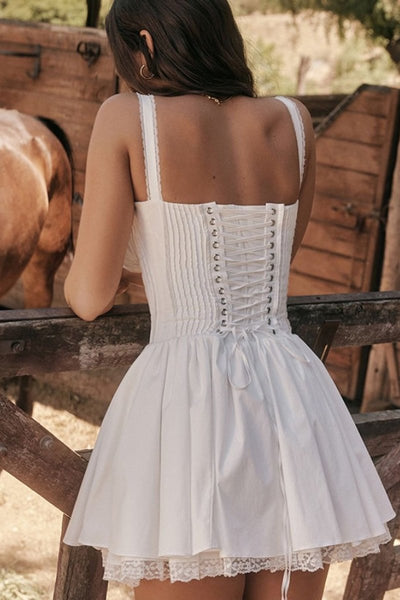 VESTIDO MINI ABULLONADO CON CORSÉ DE ENCAJE INÉS